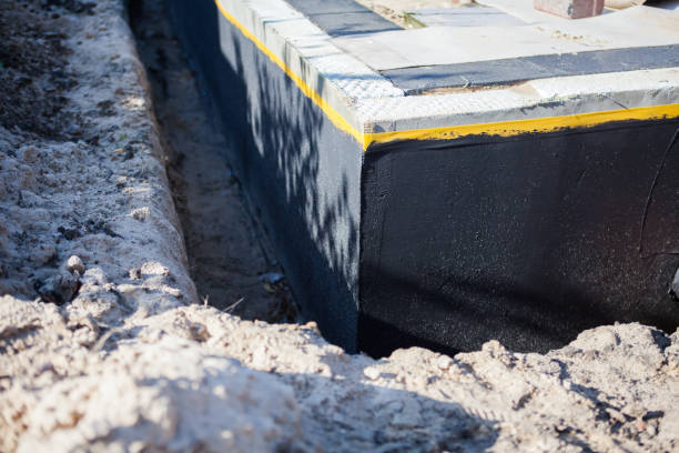 Professional Emergency Waterproofing technician working in Quincy, IL